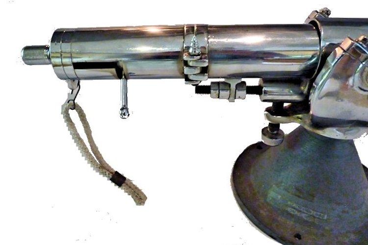 The lever on the closed breech locks the block of the deck cannon image