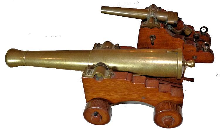 View of much larger ship's cannon with napoleon barrel image